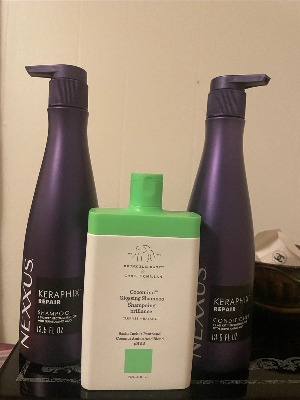 Drunk Elephant Cocomino Glossing Shampoo and Nexxus Keraphix repair